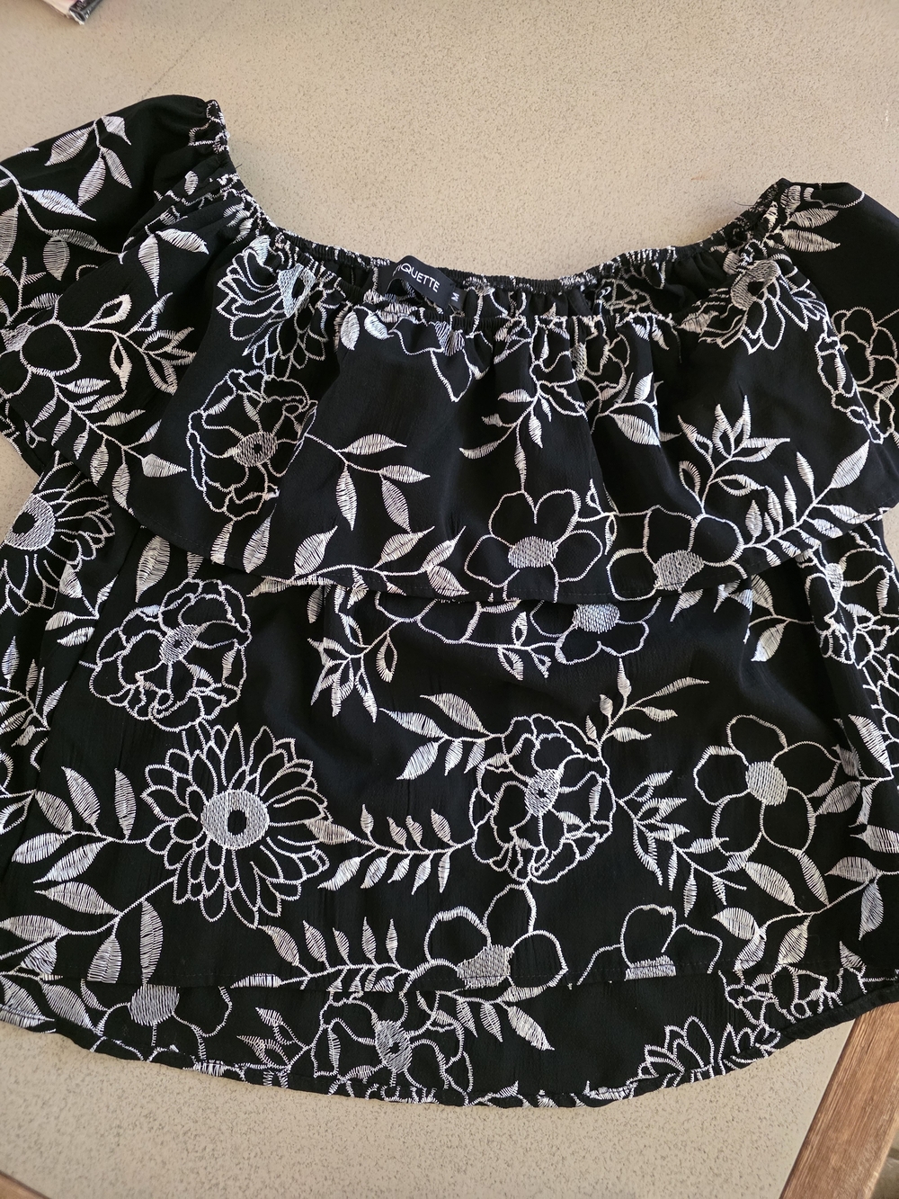 Etiquette Clothiers Black Off-Shoulder Floral Embroidered Tunic